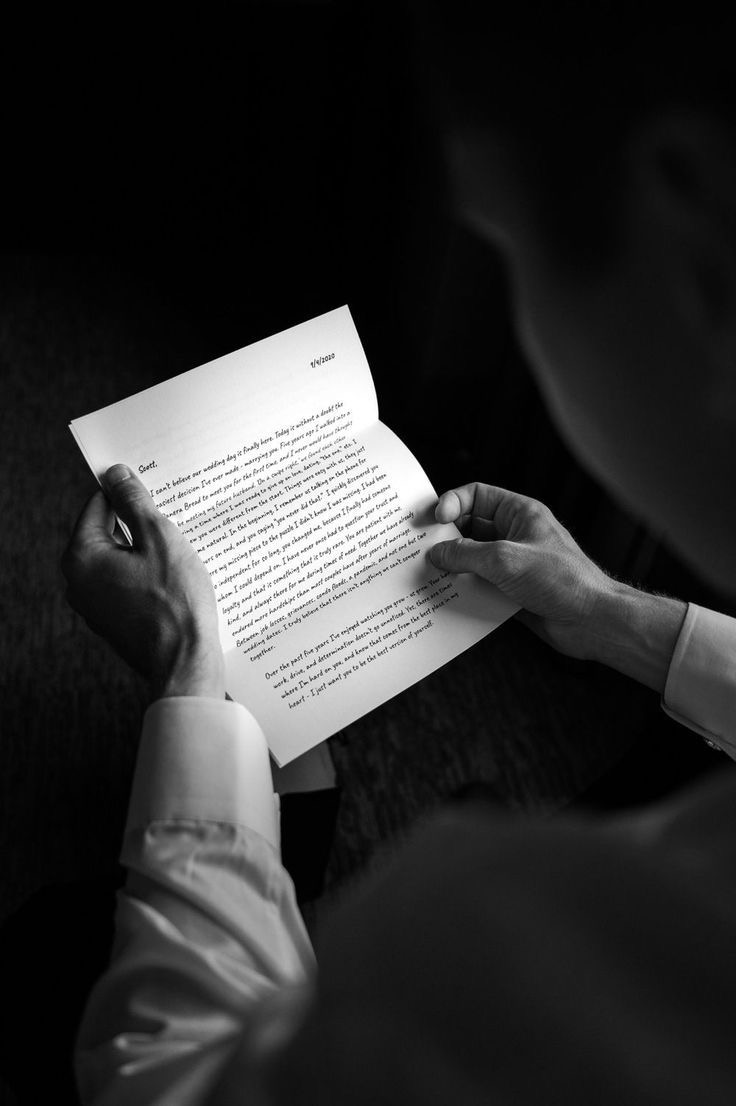 Hands reading a letter — succession and family-office counsel